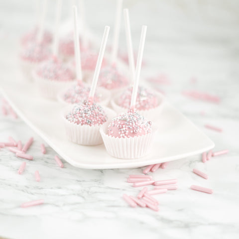 Roze cakepops met bijpassende sprinkles